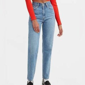 Levi’s high waist taper jeans size 27/27 mid wash denim